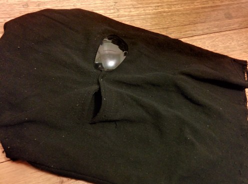 Ninja mask with one sunglass(?) lens